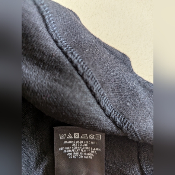 Chic Black Sleeveless Peplum Top - Picture 5 of 6